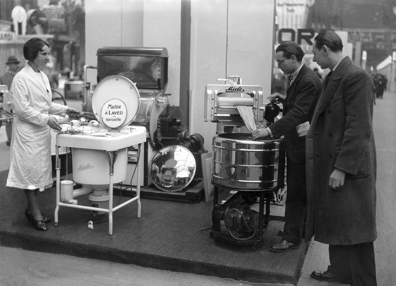 MIELE dish washer prototype and washing machine demonstration, Paris, France, 1950.