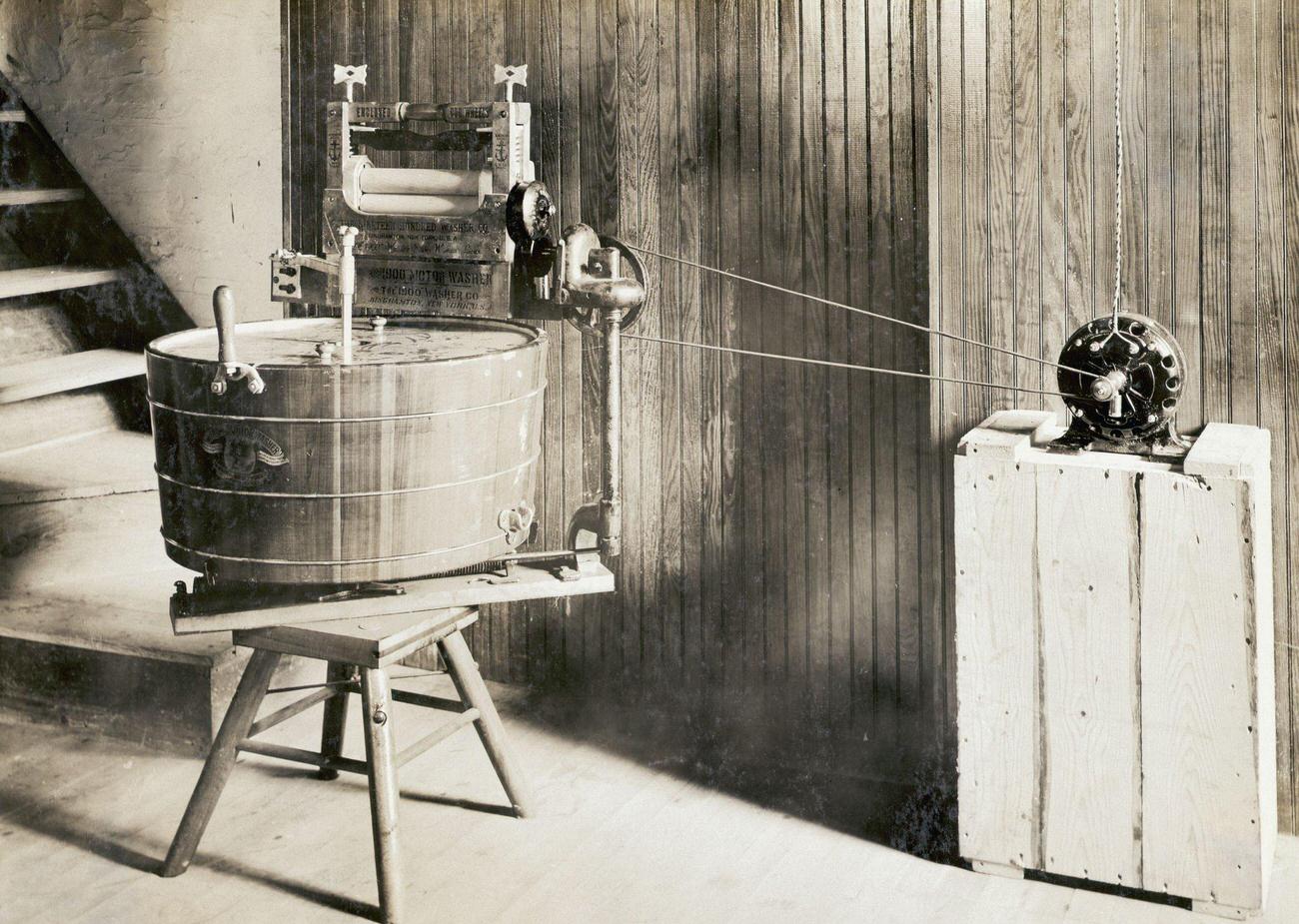 Motor-driven washing machine and wringer.