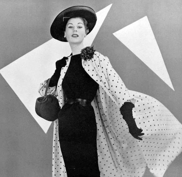 Stella in Madeleine de Rauch's silk coat and alpaca dress, 1953.