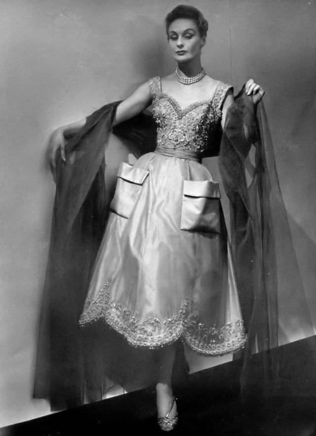 Anna in Madeleine de Rauch's honey-colored satin dance dress, 1954.