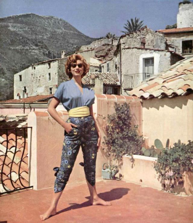 Marie-Hélène in Madeleine de Rauch's floral print pirate pants, Roquebrune, 1954.