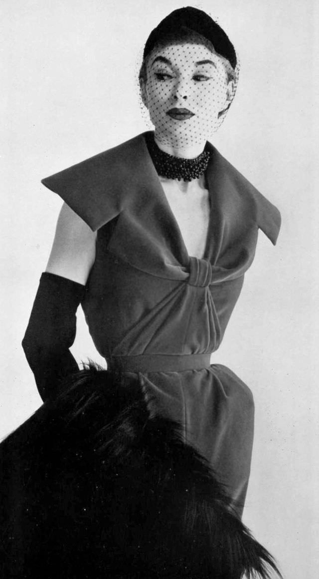 Model in Madeleine de Rauch's velvet cocktail sheath, 1954.