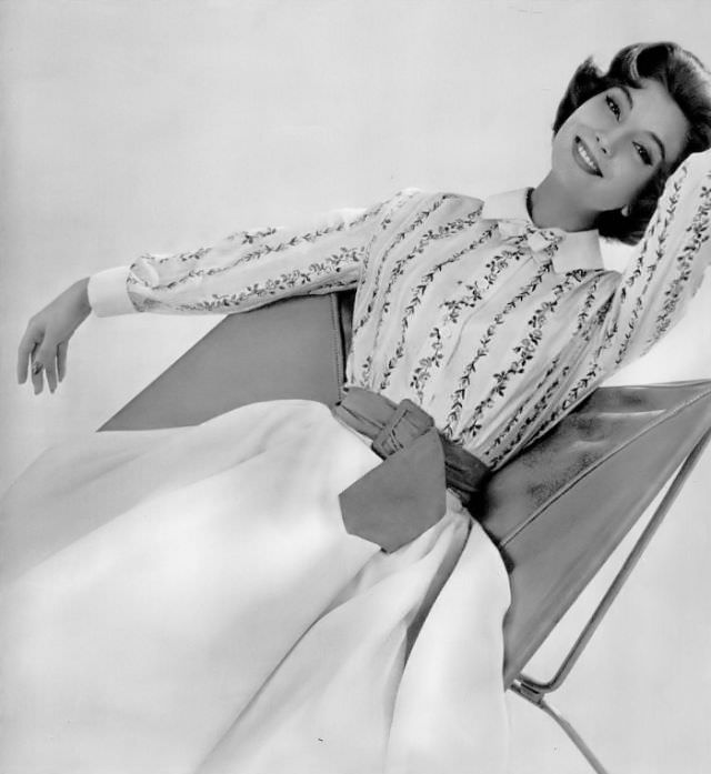 Marie-Hélène in Madeleine de Rauch's cotton floral blouse and wool skirt, 1956.
