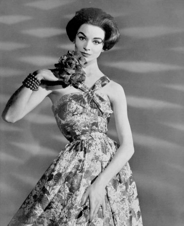 Tan Arnold in Madeleine de Rauch's cotton print halter dress, 1957.