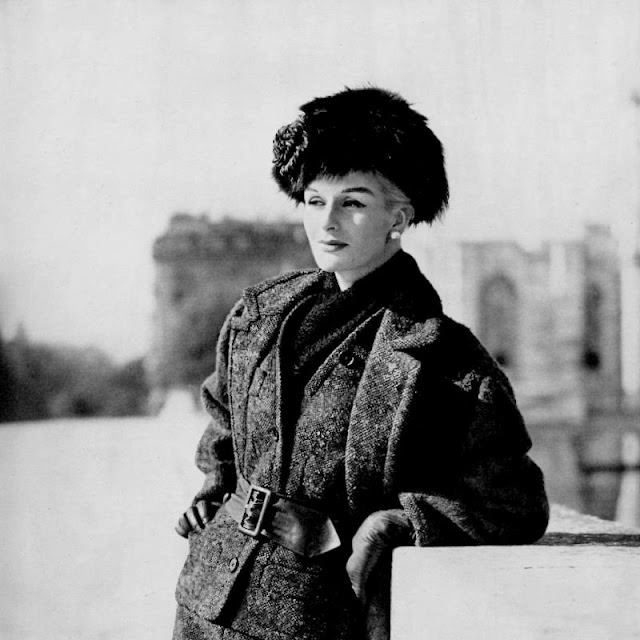 Model in Madeleine de Rauch's green tweed suit and coat, 1959.