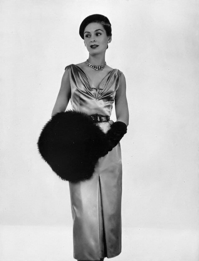 Model in Madeleine de Rauch's Celanese satin cocktail dress, Georges Saad photo, 1952.