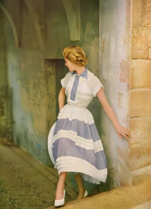 Model in Susan Small's muslin summer dress, Harper's Bazaar UK, June 1951.