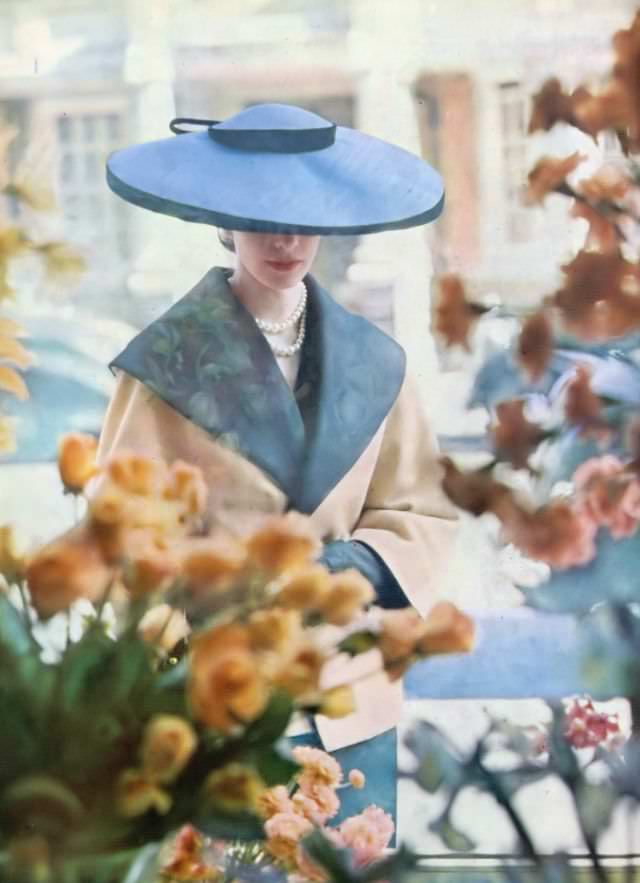 Model in R.M.Hats' blue shantung cartwheel hat, Harper's Bazaar UK, July 1951.