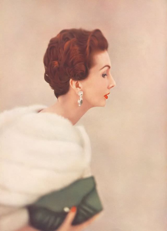 Barbara Goalen with Raymond hair styling, earrings and purse, Harper's Bazaar UK, April 1952.