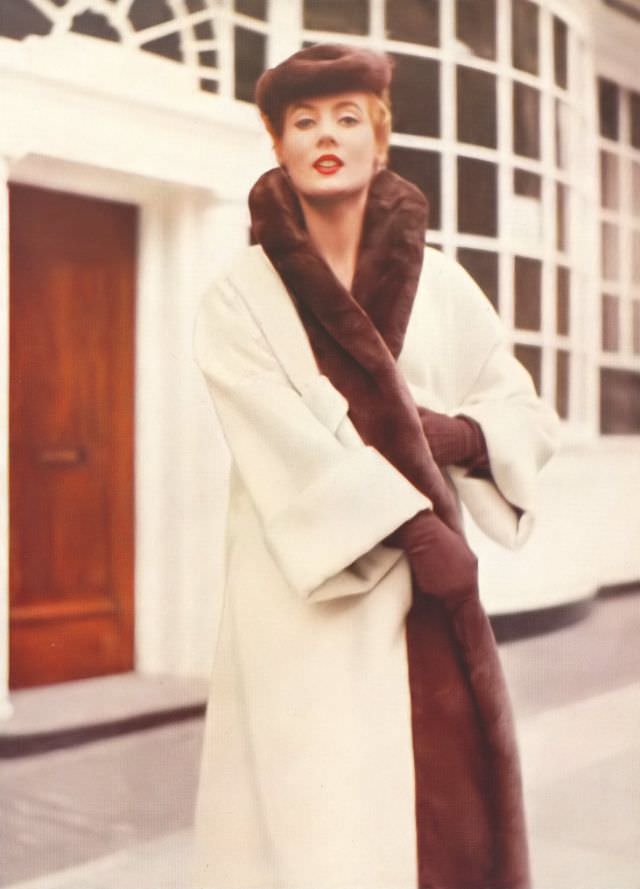 Pat O'Reilly in Norman Hartnell's camel-wool coat, Harper's Bazaar UK, September 1952.