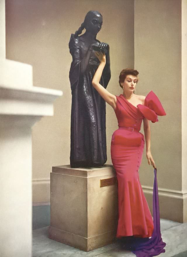 Model in Hardy Amies' Lyons velvet gown at Tate Gallery, Harper's Bazaar UK, November 1950.