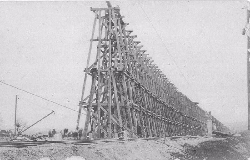 Erie Railroad constructing trestle over B&S Railroad.
