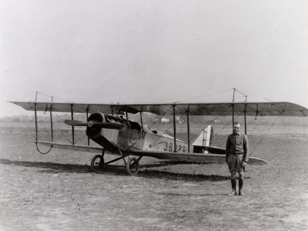 Pilot Eddie Gardner with an airmail plane, 1918.