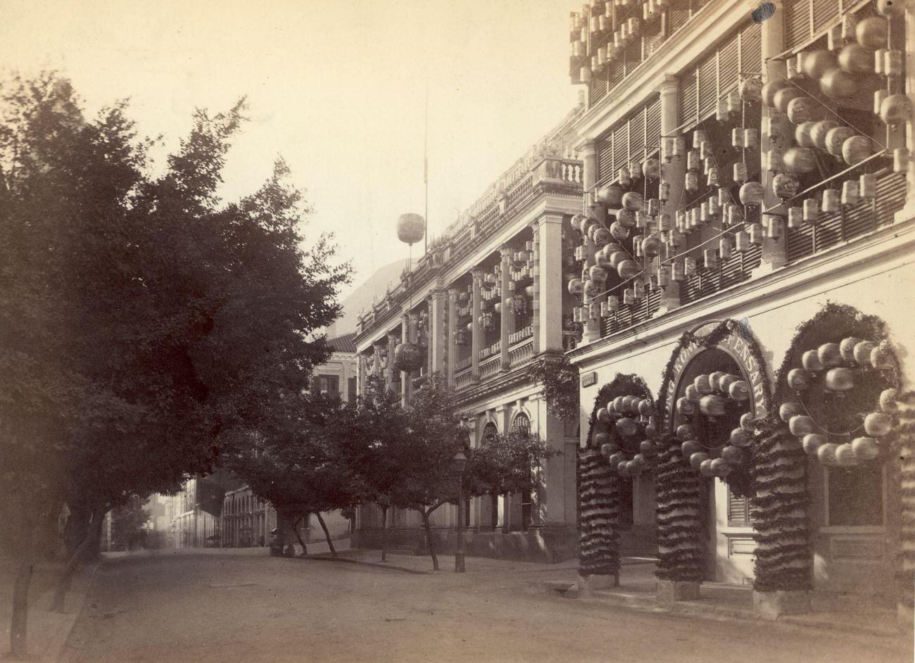 Queen's Road, Hong Kong, illuminated for the Duke of Edinburgh's visit in 1869.