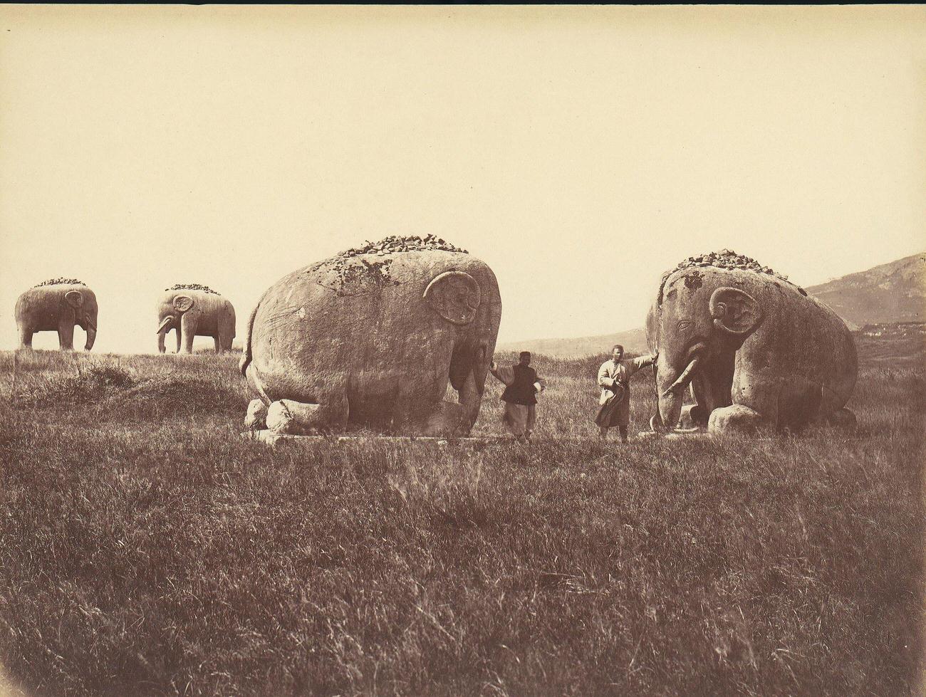 Two Men by Monumental Elephant Statues, China, 1860s