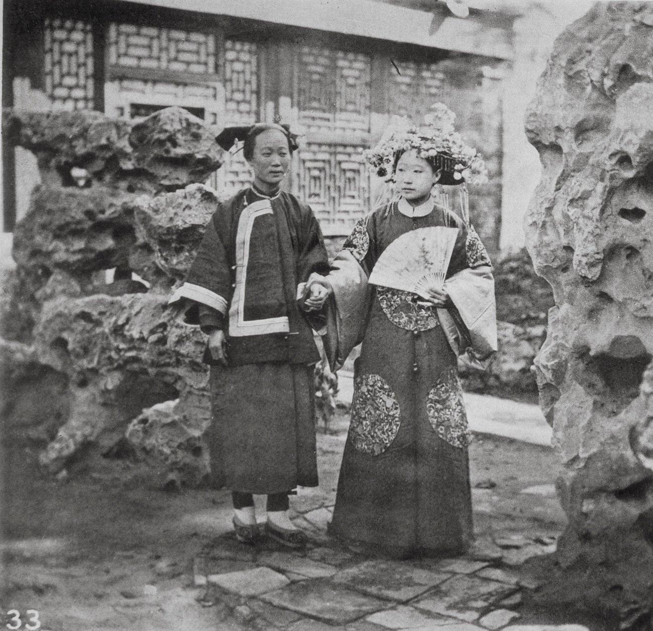 Two Manchu Ladies in a Rock Garden, China, 1870s