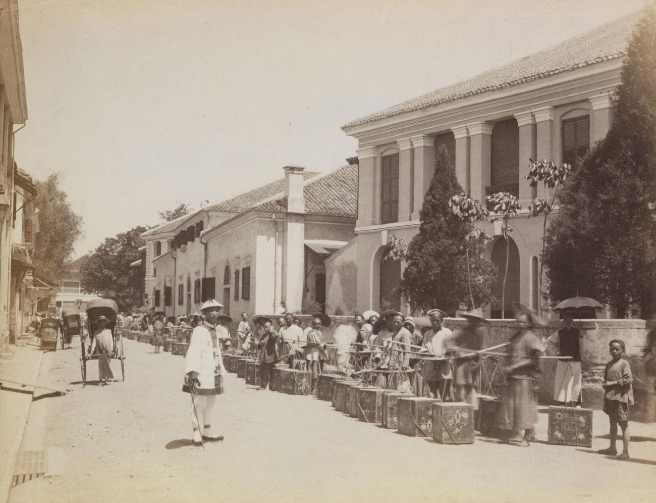 Carrying Half-Chests of Tea, Hankou, China, 1875