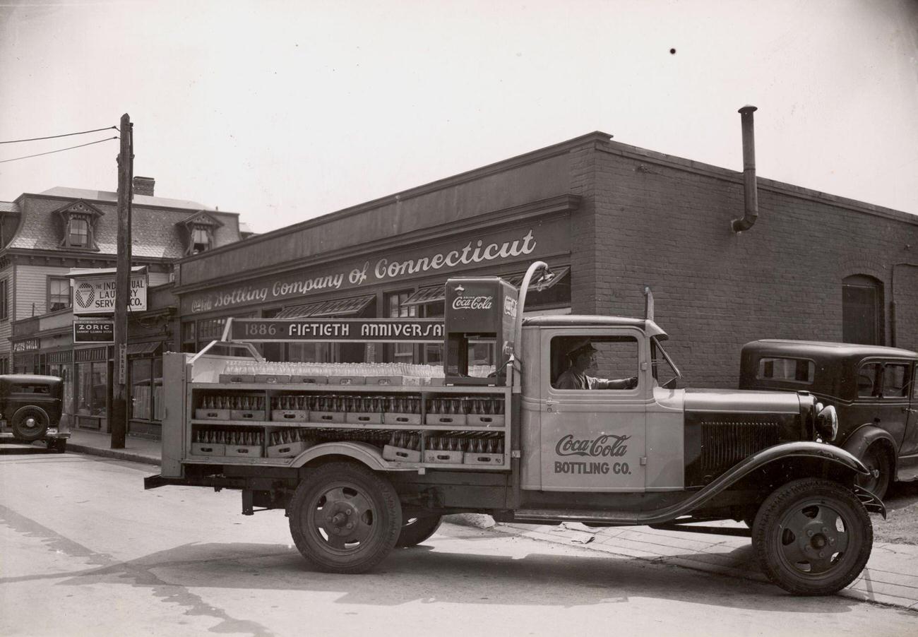 A truck full of bottles departing from the Coca-Cola Bottling Company of Connecticut on the product's 50th anniversary, 1936.
