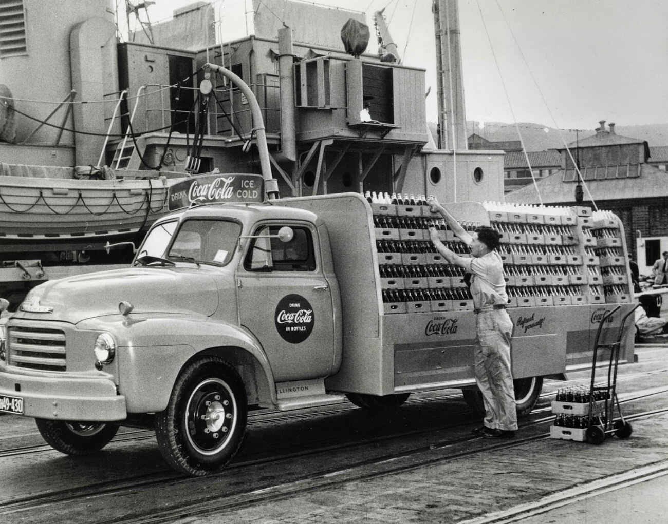 Coca-Cola being loaded onto the Endeavor, New Zealand's Antarctic supply ship, 1957.