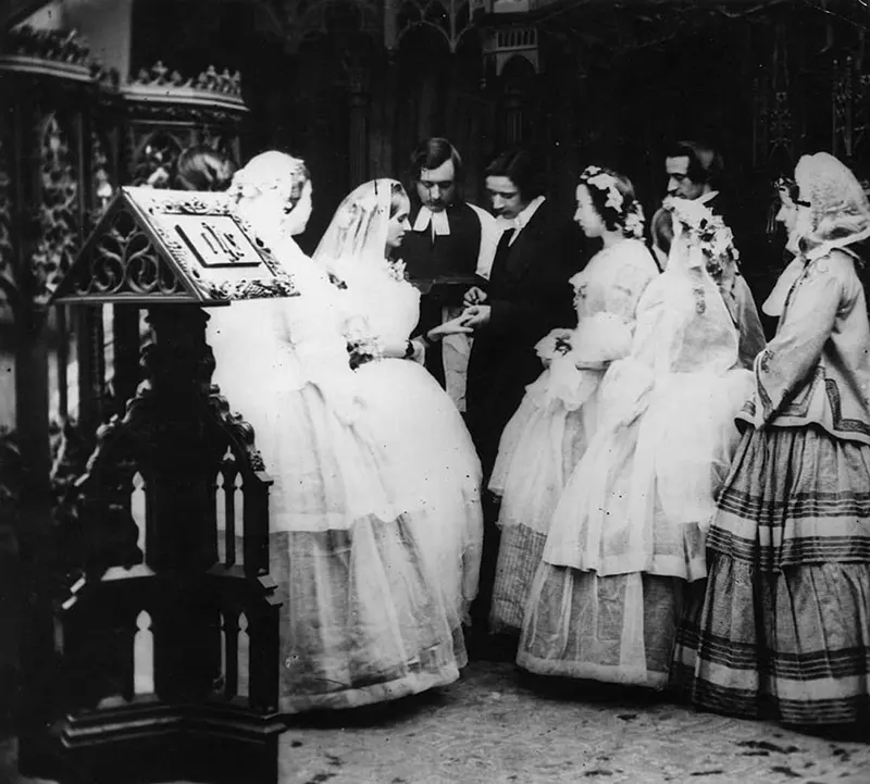 Young couple exchanging wedding rings, 1860.