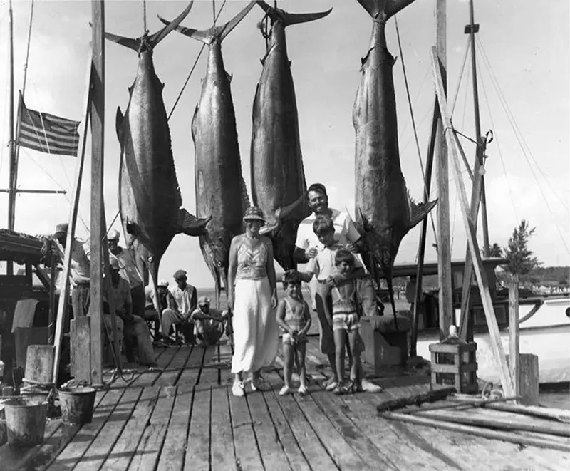 Ernest Hemingway and family with marlins, Bimini, 1935.