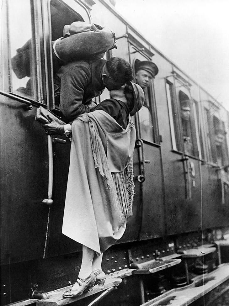 US soldier kissing girlfriend goodbye, 1922.