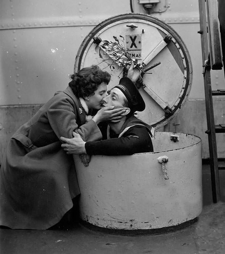 D. Brown kissing fiance Terry, HMS Wakeful, Portsmouth, 1955.
