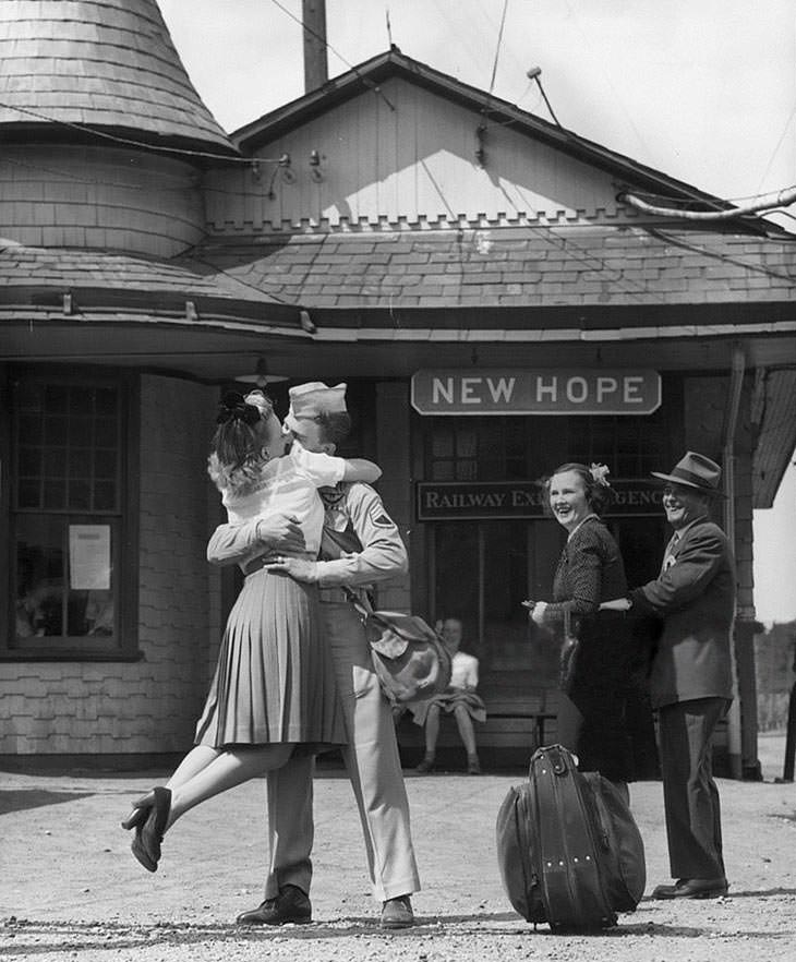 Woman kissing US soldier at Connecticut train station, 1945.