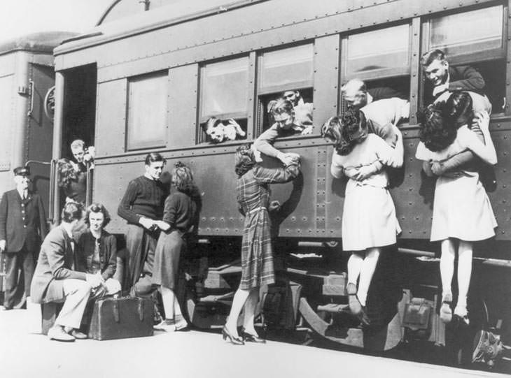 Goodbye at train station before WWII deployment.