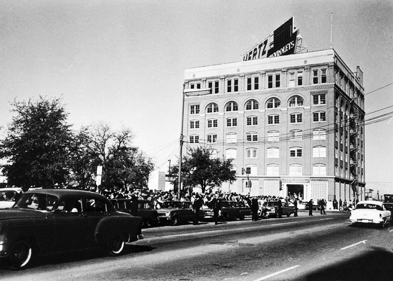 A crowd awaits President Kennedy's motorcade at Dealey Park in Dallas, Texas, just prior to his assassination, 1963.