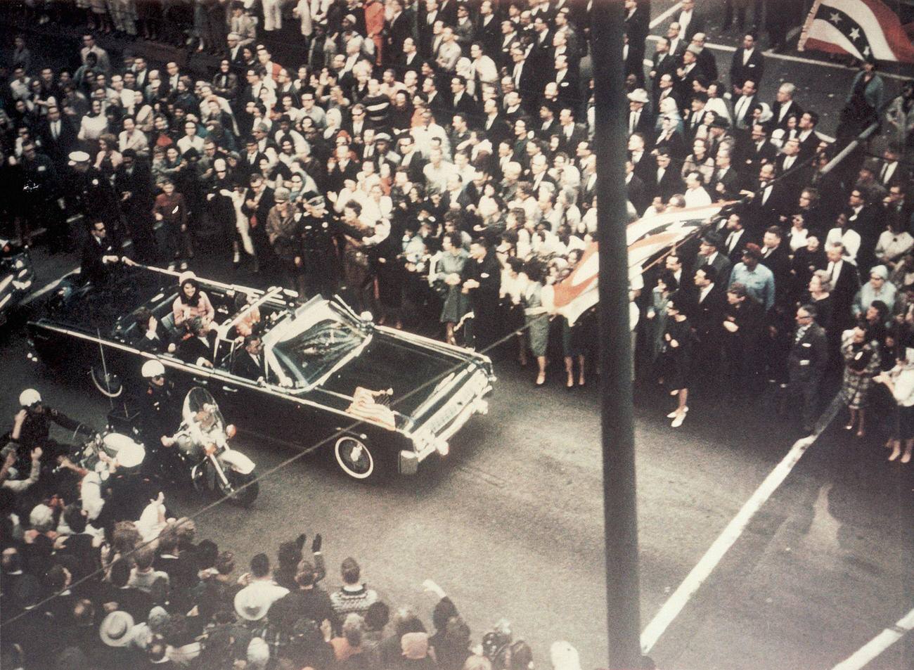 John F. Kennedy, First Lady Jacqueline Kennedy, and Texas Governor John Connally in Dallas streets before the assassination, 1963.