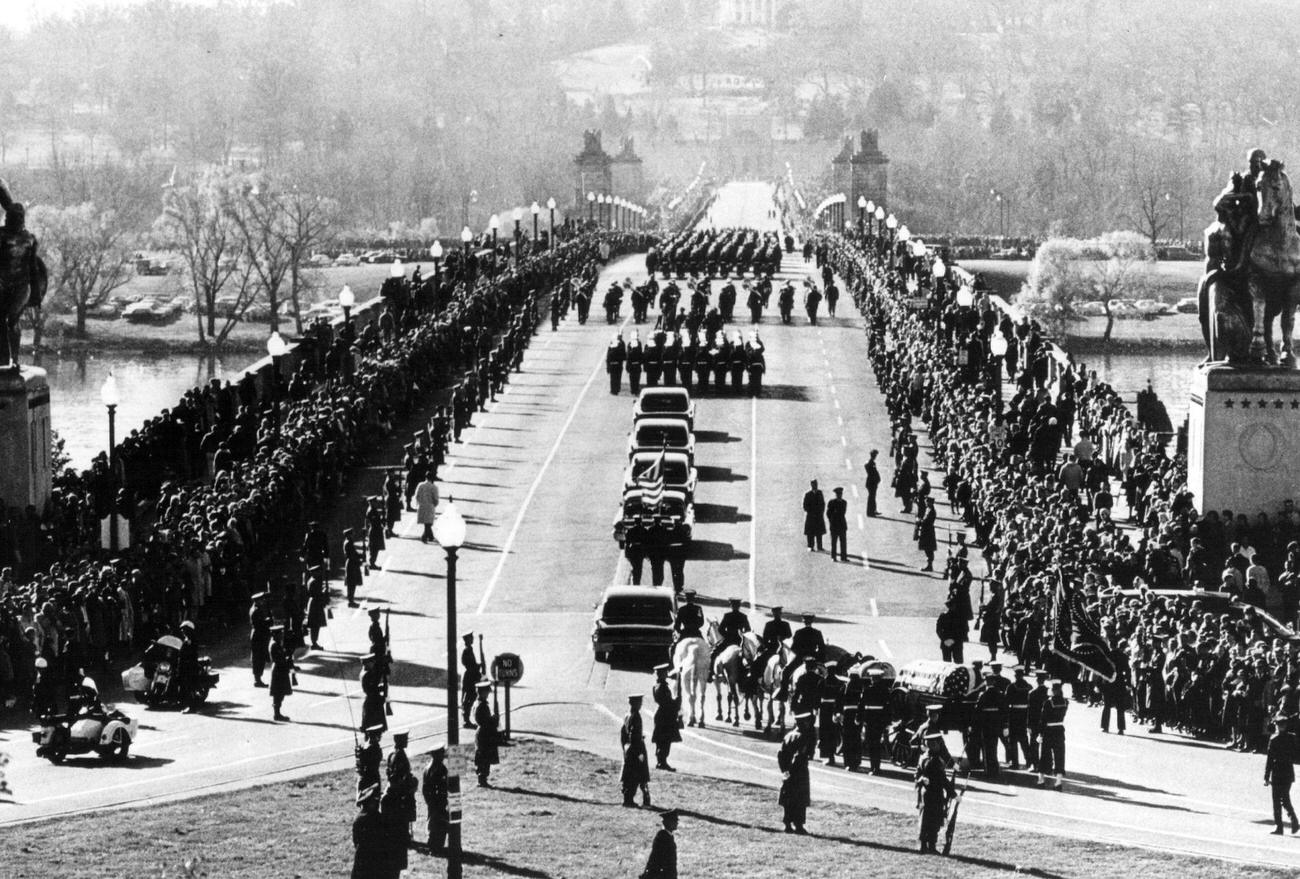 John F. Kennedy's funeral procession in Arlington Cemetery, Washington, after his assassination in Dallas, Texas, 1963.