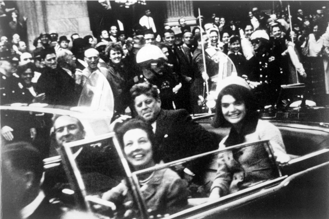 John F. Kennedy, First Lady Jacqueline Kennedy, and Texas Governor John Connally with his wife in a Dallas motorcade, 1963.