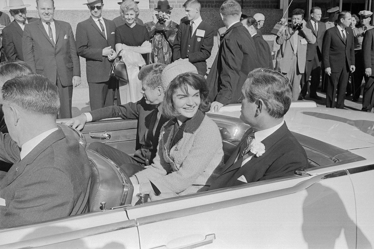 John F. Kennedy, First Lady Jacqueline Kennedy, and Texas Governor John Connally in a motorcade.