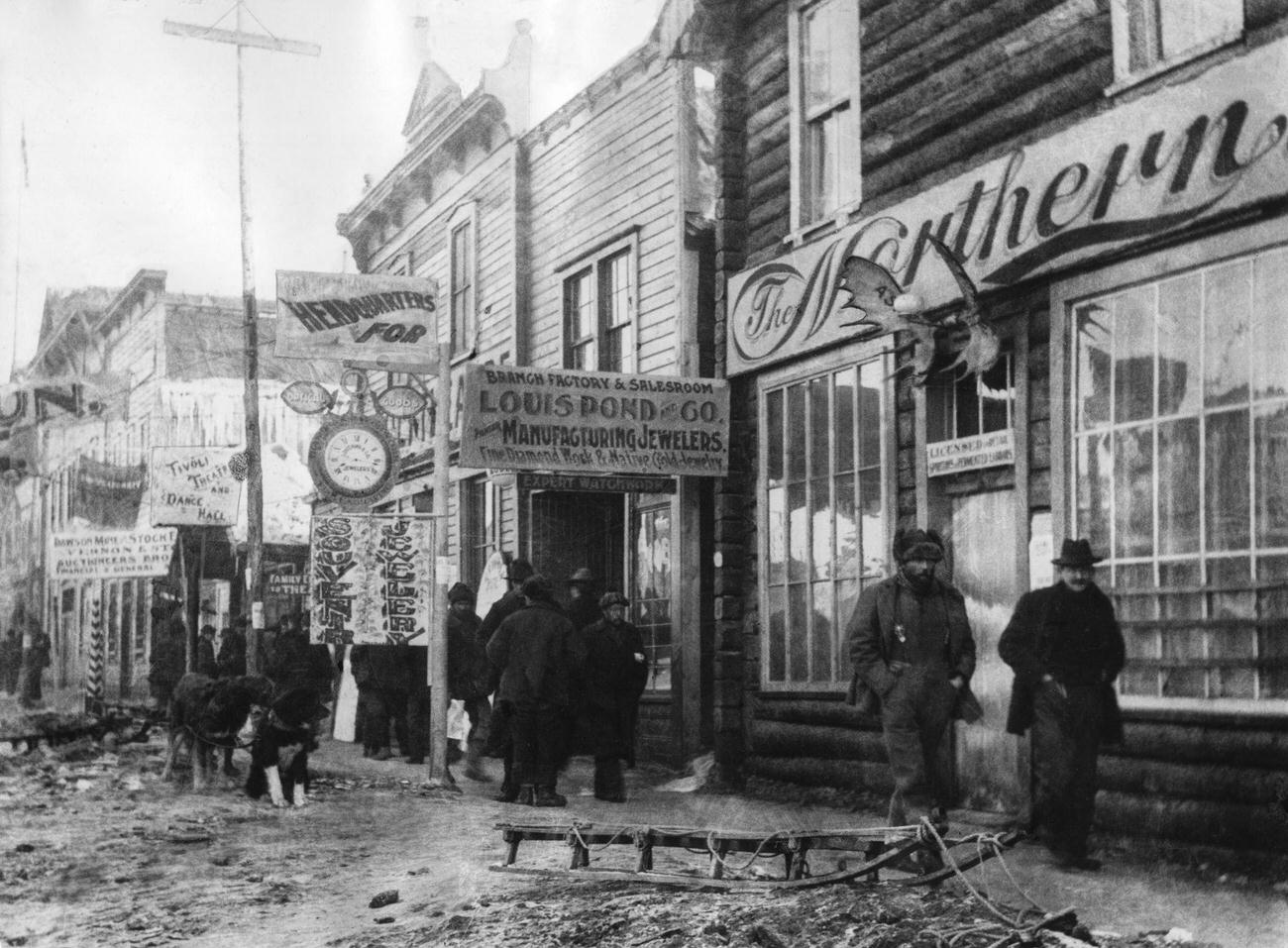 Gold prospectors on the main street of Dawson City during the Klondike Gold Rush, Canada, 1896.