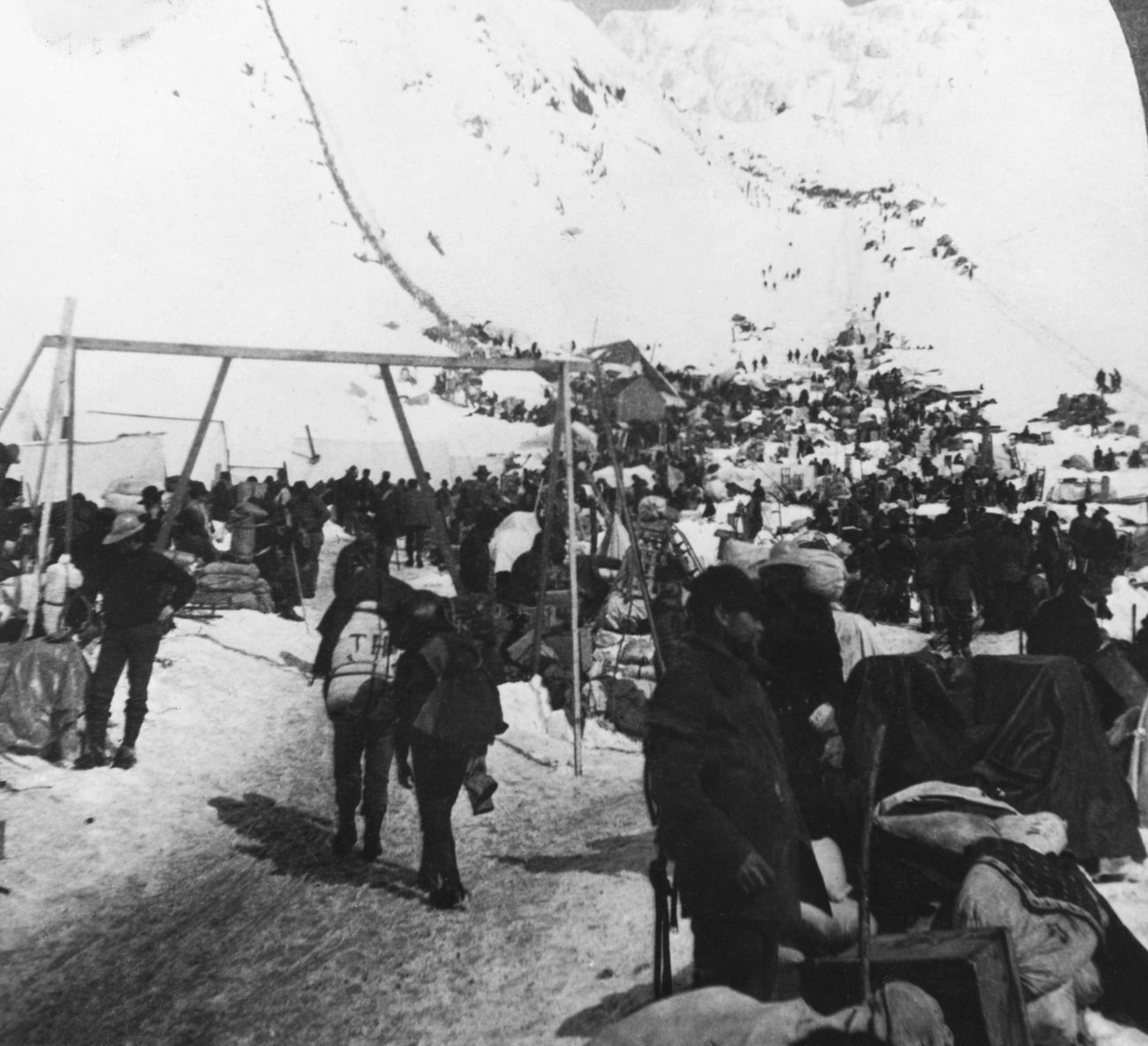 Gold prospectors crossing Chilkoot Pass between Canada and the US during the Klondike Gold Rush, 1887.