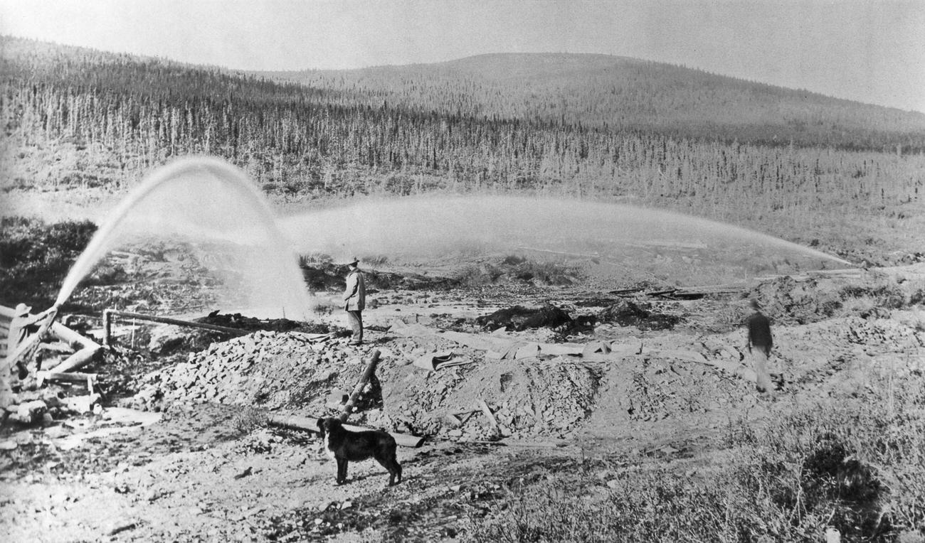 Miners using water hoses during the Klondike Gold Rush in Yukon, Canada, circa 1898.