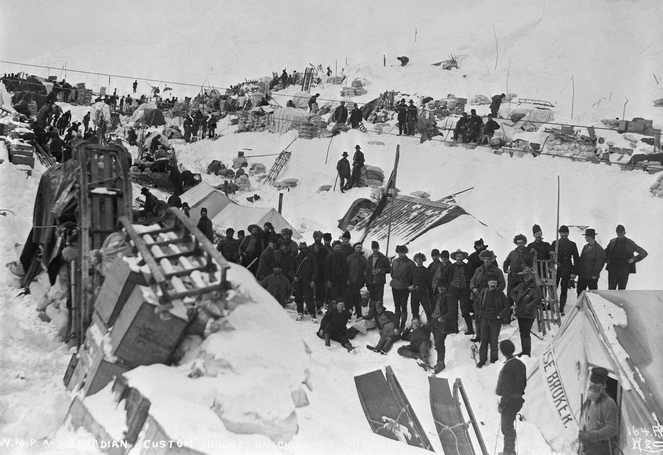 Goldseekers at the Canadian custom station at Chilkoot Summit during the Klondike Gold Rush.