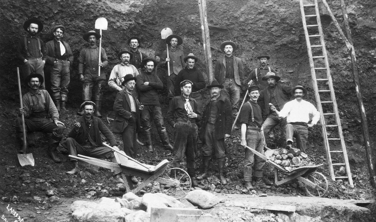 Miners engaged in pick and shovel mining in Alaska during the Klondike Gold Rush.