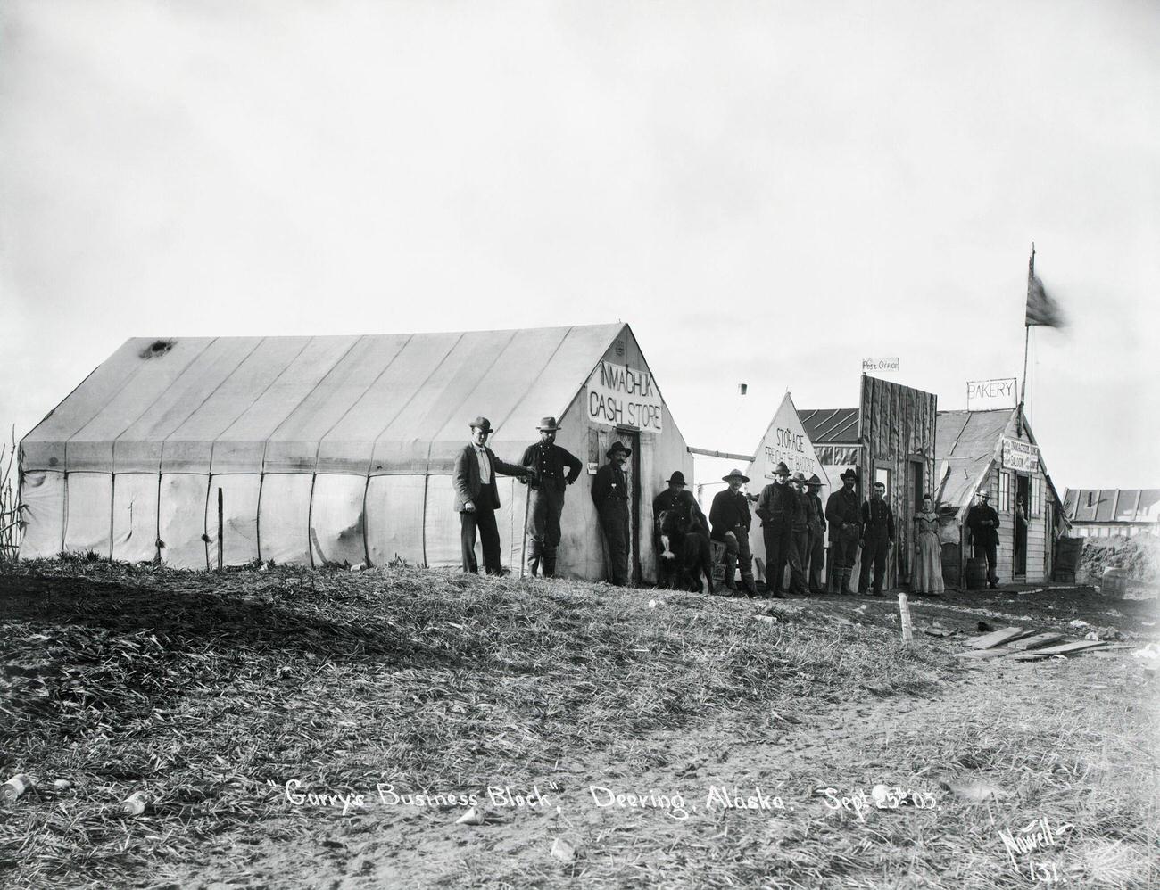 Gurry's Business Block in Deering, Alaska, featuring tent stores and a bakery-saloon, 1903.