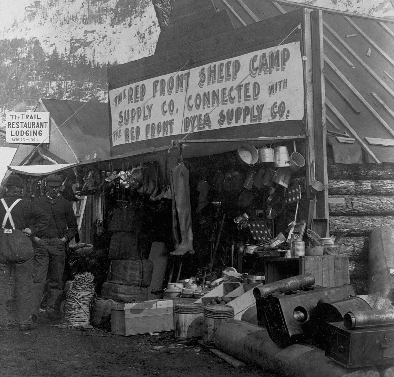 Red Front Sheep Camp Supply Company tent and log structure in Sheep Camp, Alaska, 1898.