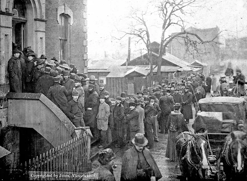 Klondikers purchasing miner's licenses at the Custom House in Victoria, BC, February 12, 1898.