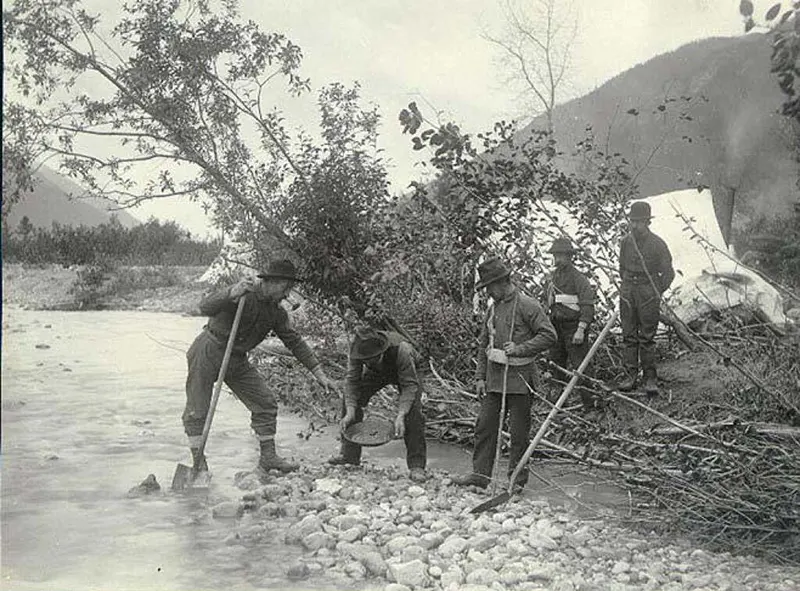 Prospectors panning for gold in a creek in Alaska, 1897.