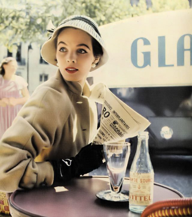 Linda Harper wearing a zebra-striped felt cloche by Svend, 1953.