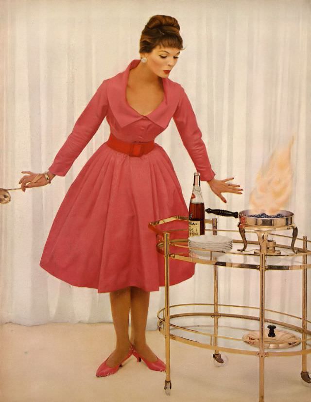 Linda Harper in a pink moiré bodice and orange velveteen belt by Toni Owen, 1958.