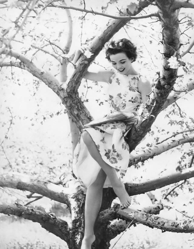 Linda Harper in a floral print summer dress, 1953.