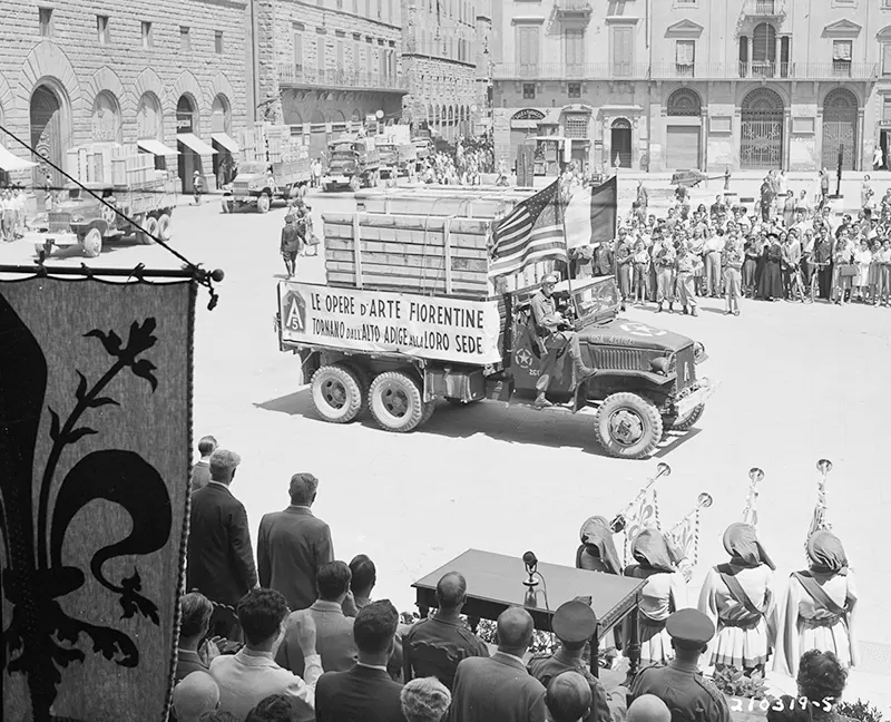 Six trucks with Florentine art treasure, Piazzo Dei Signoria, Florence, Italy.