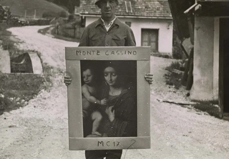 Unidentified G.I. with Madonna and Child painting, Altaussee, Austria, 1945.