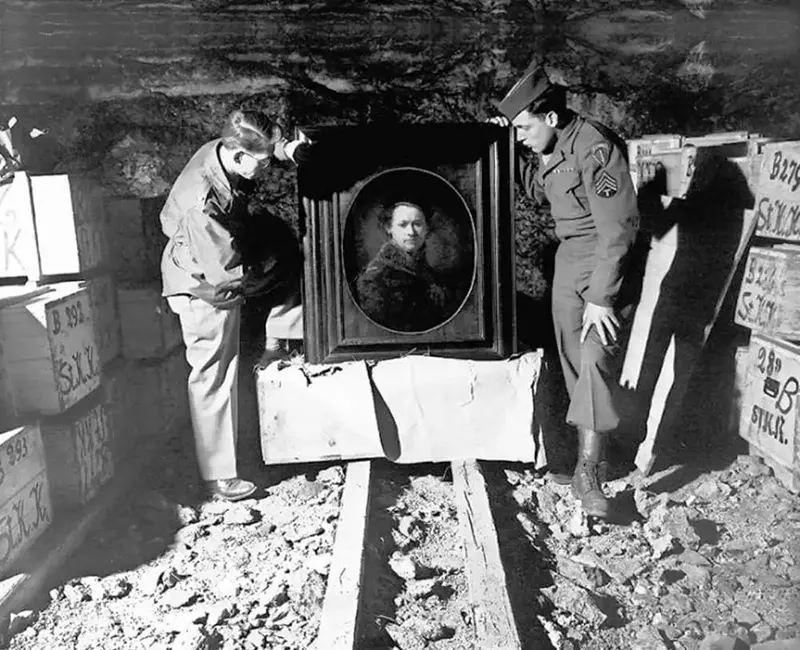 Sgt. Harry Ettlinger, Lt. Dale Ford repatriating Rembrandt, German salt mine, 1945.