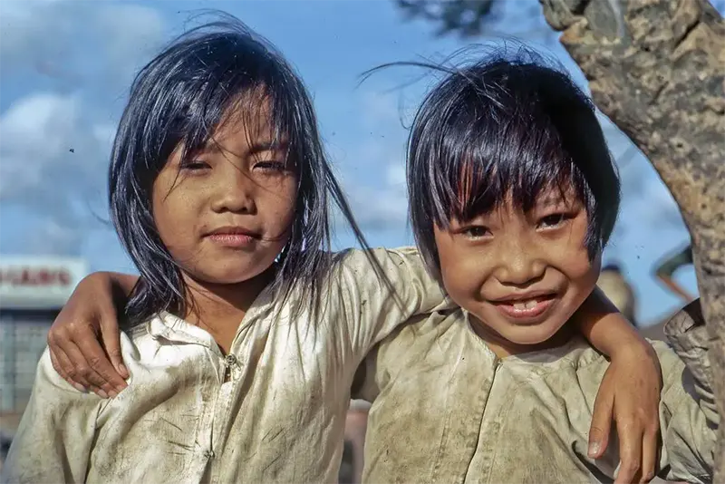 Two children posing at Mekong Riverfront, My Tho, southeast, circa 1969.